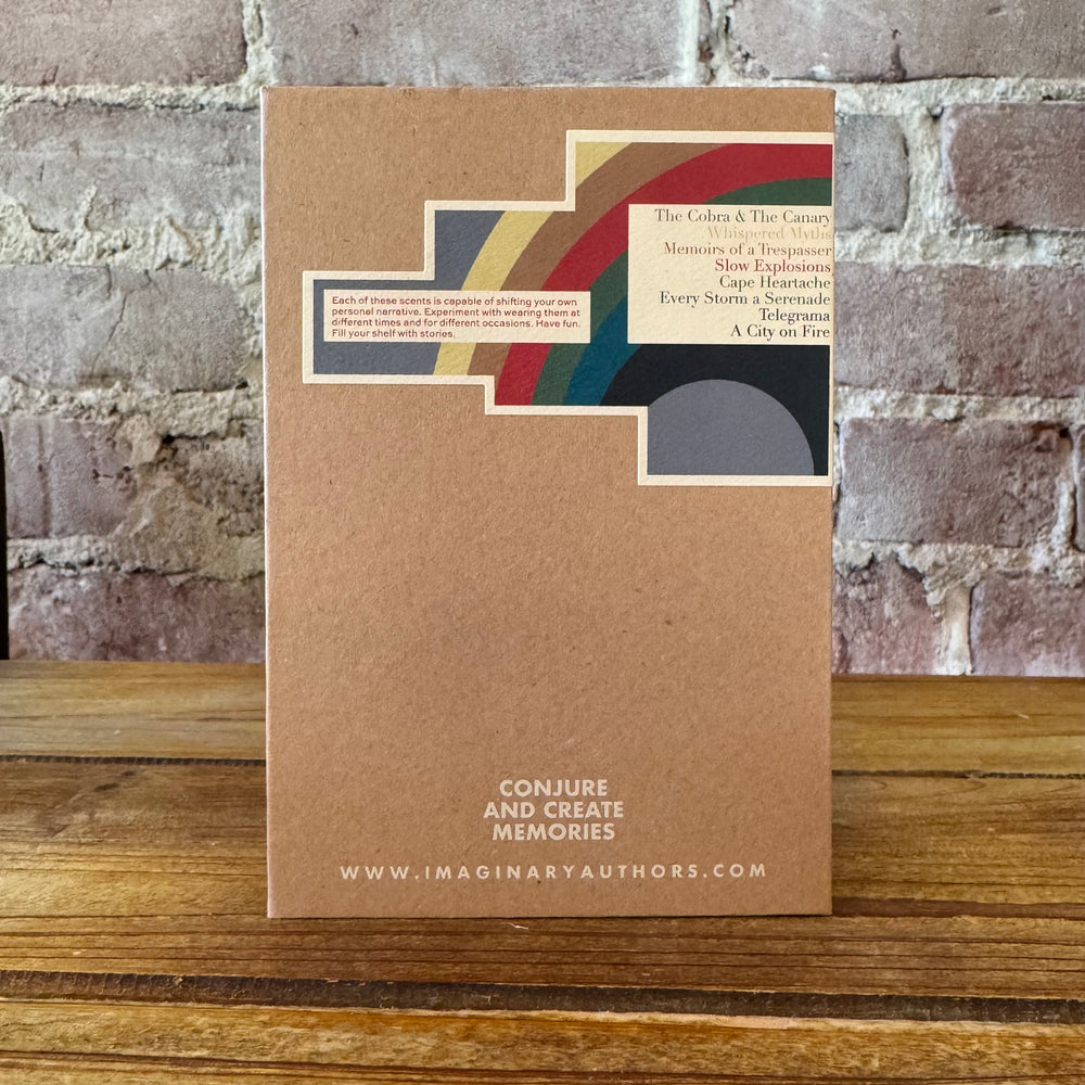 Kraft paper book packaging with decorative elements on a wooden surface and brick wall background